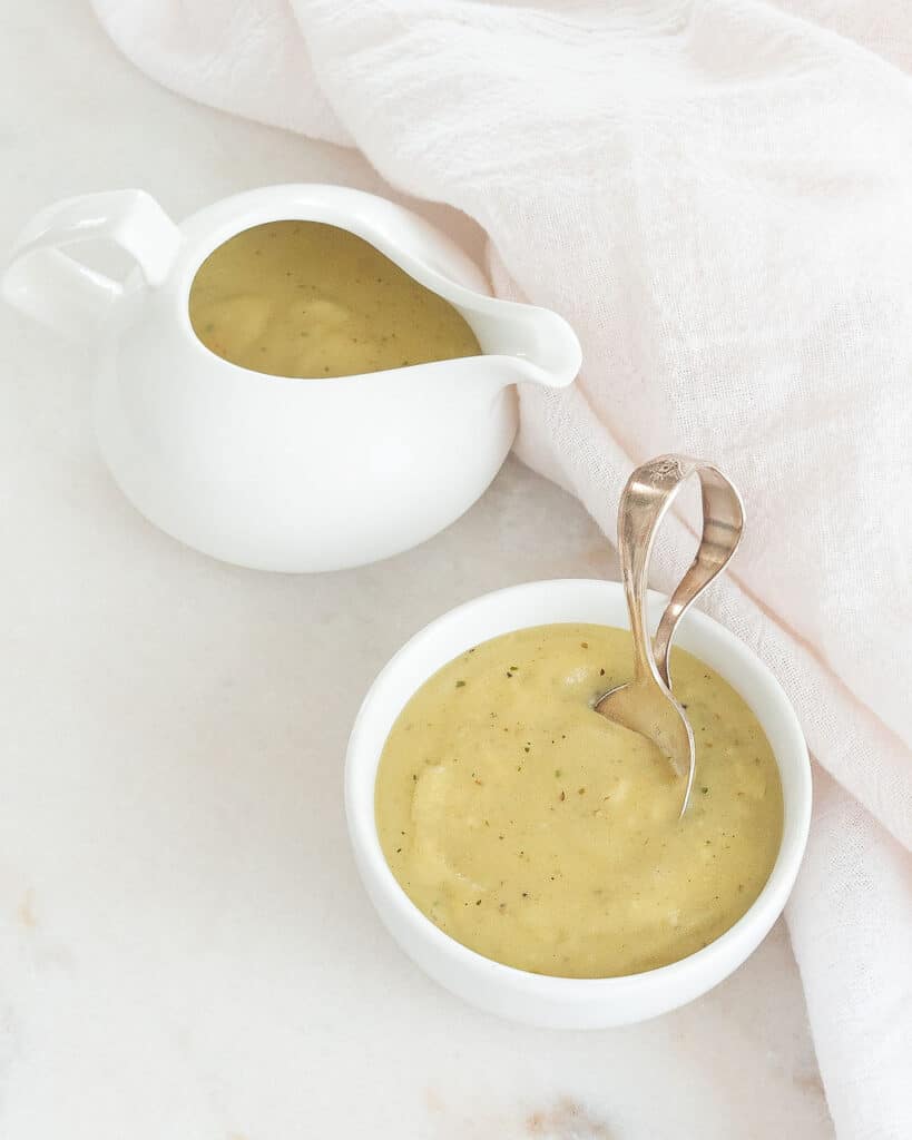 Vegan Simple Gravy in a gravy pot against a white background