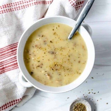 completed bowl of mushroom gravy against a white background