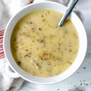 completed bowl of mushroom gravy against a white background