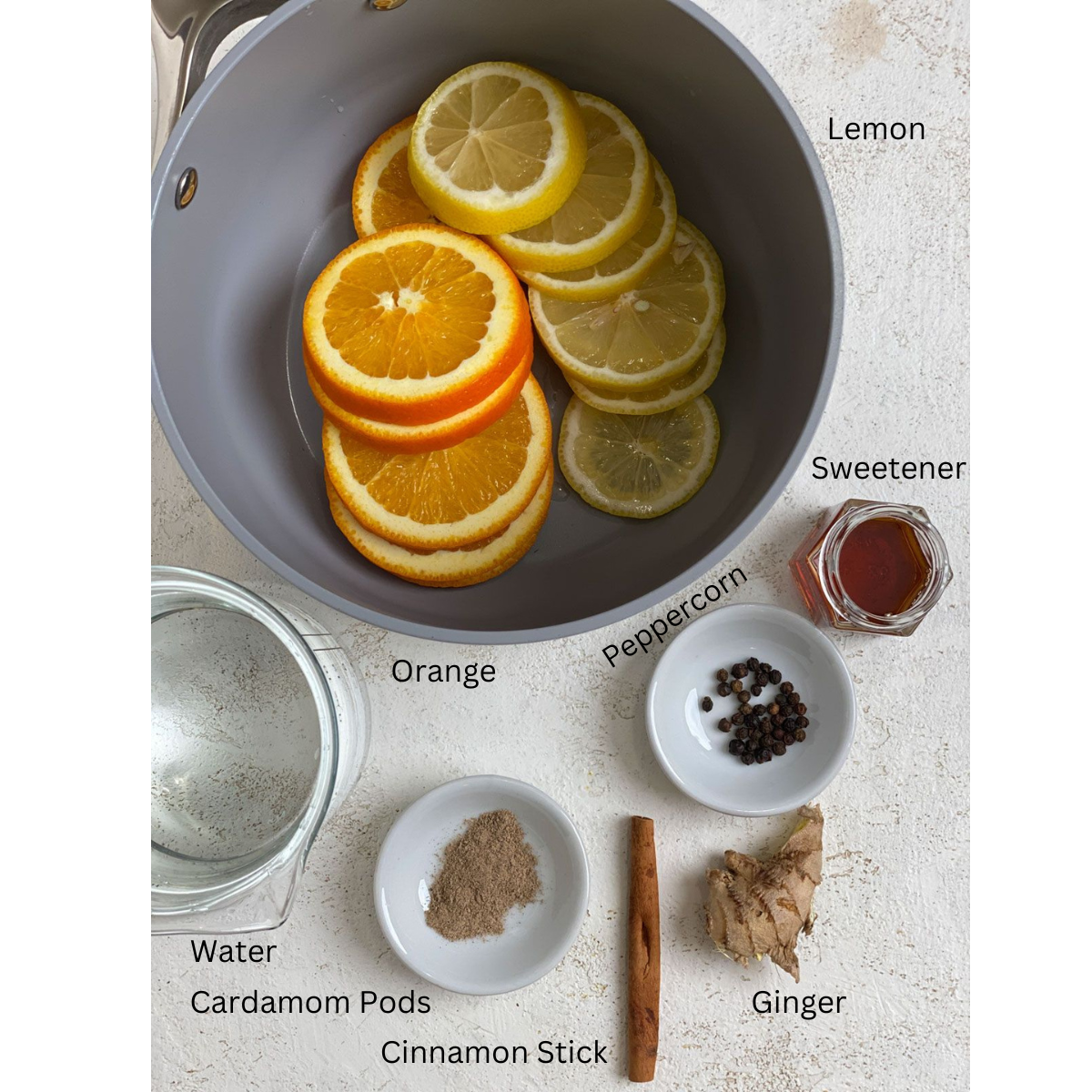 ingredients for Winter Tonic measured out against a white surface