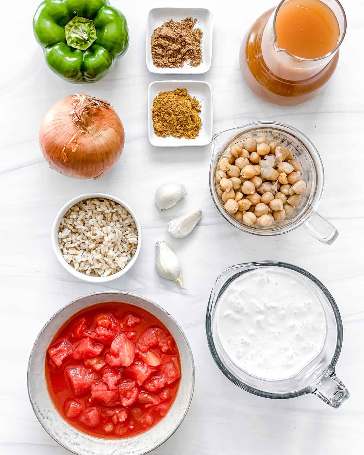 Coconut Curry Soup Ingredients measured out against white background