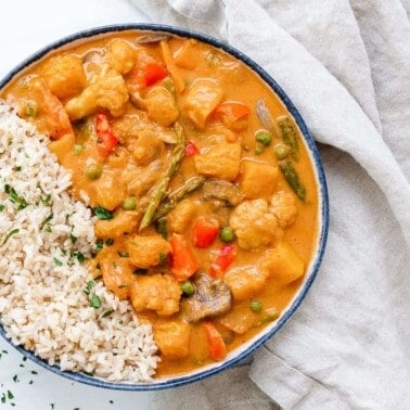 completed butternut squash curry in a bowl against a light background