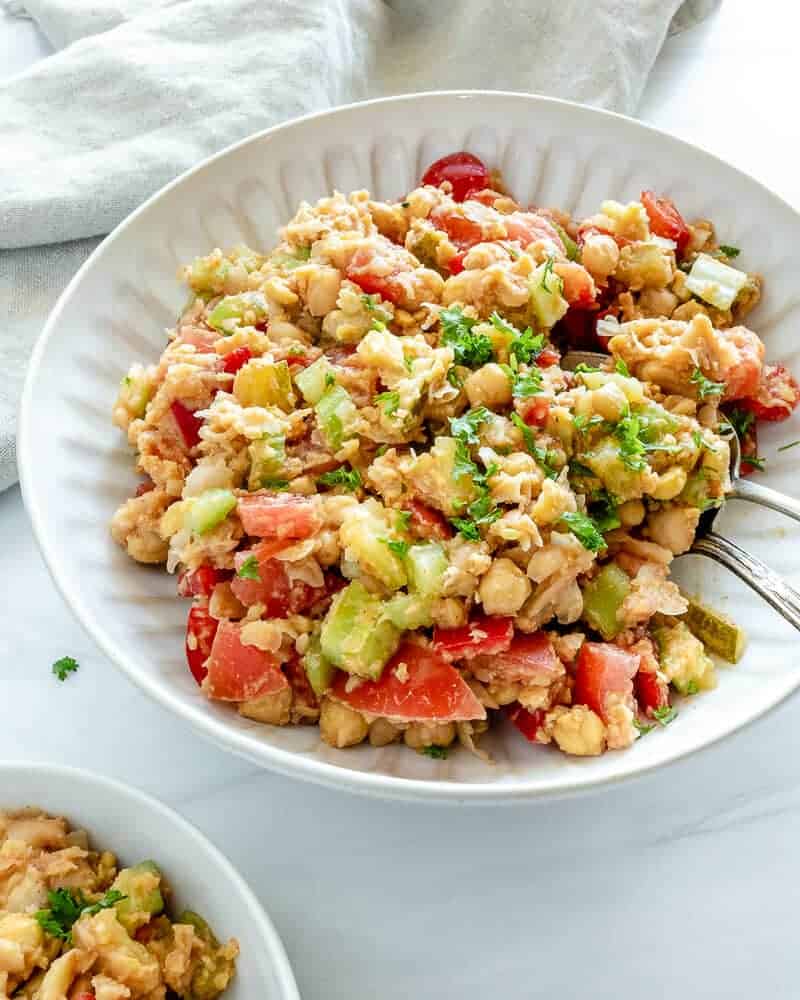 cooked vegan tuna salad on a white plate against a white background