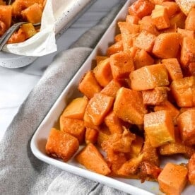 finished butternut squash on a baking dish