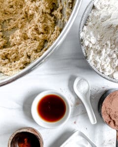 ingredients for Chocolate Peppermint Chocolate Chip Cookies against a white surface