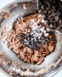 process of mixing Chocolate Peppermint Chocolate Chip Cookies dry ingredients together into a bowl