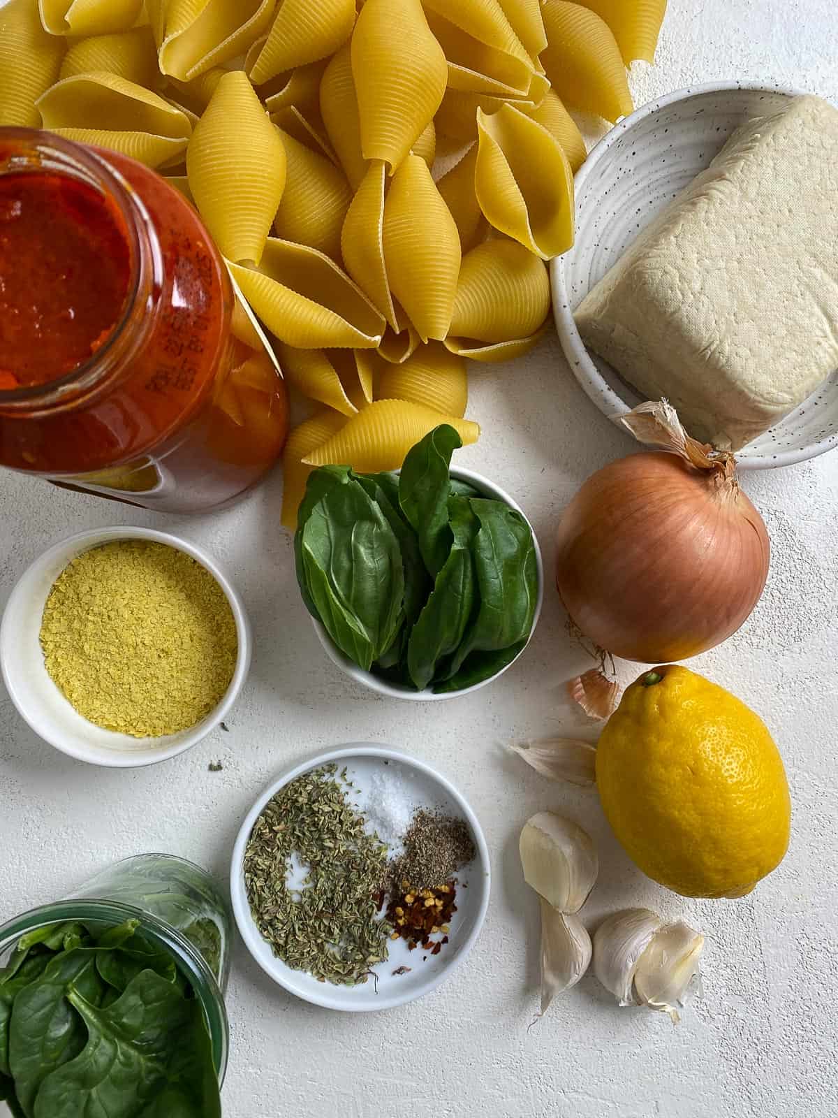 ingredients for Stuffed Shells against a white surface