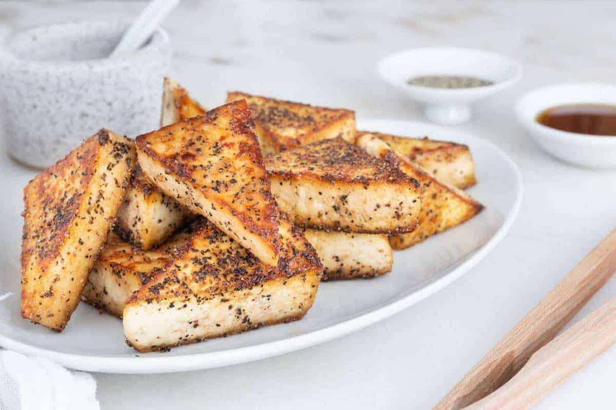 Sweet & Salty Tofu Bites on a white round dish