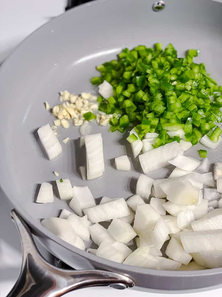 process shot showing ingredietns cooking in pan