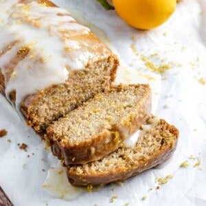 completed sliced lemon loaf against a white background