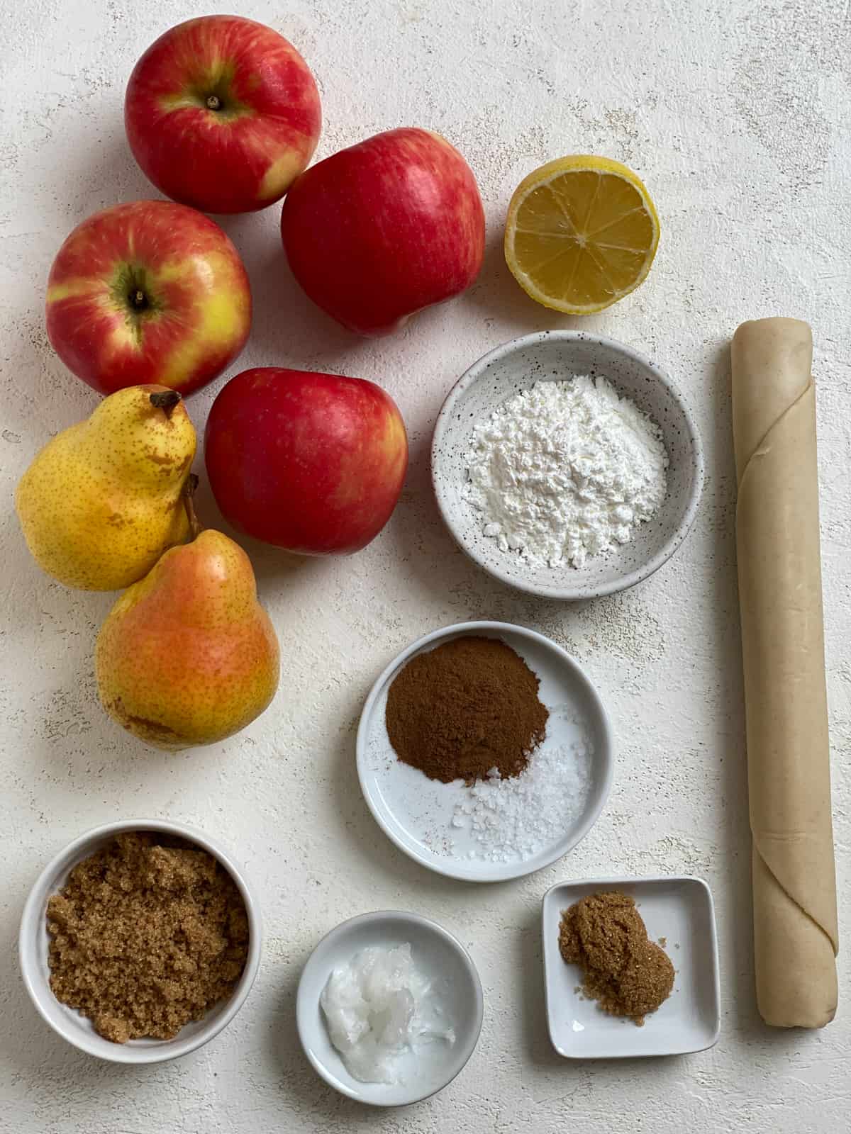 ingredients for Easy Apple Pear Pie measured out against a white surface