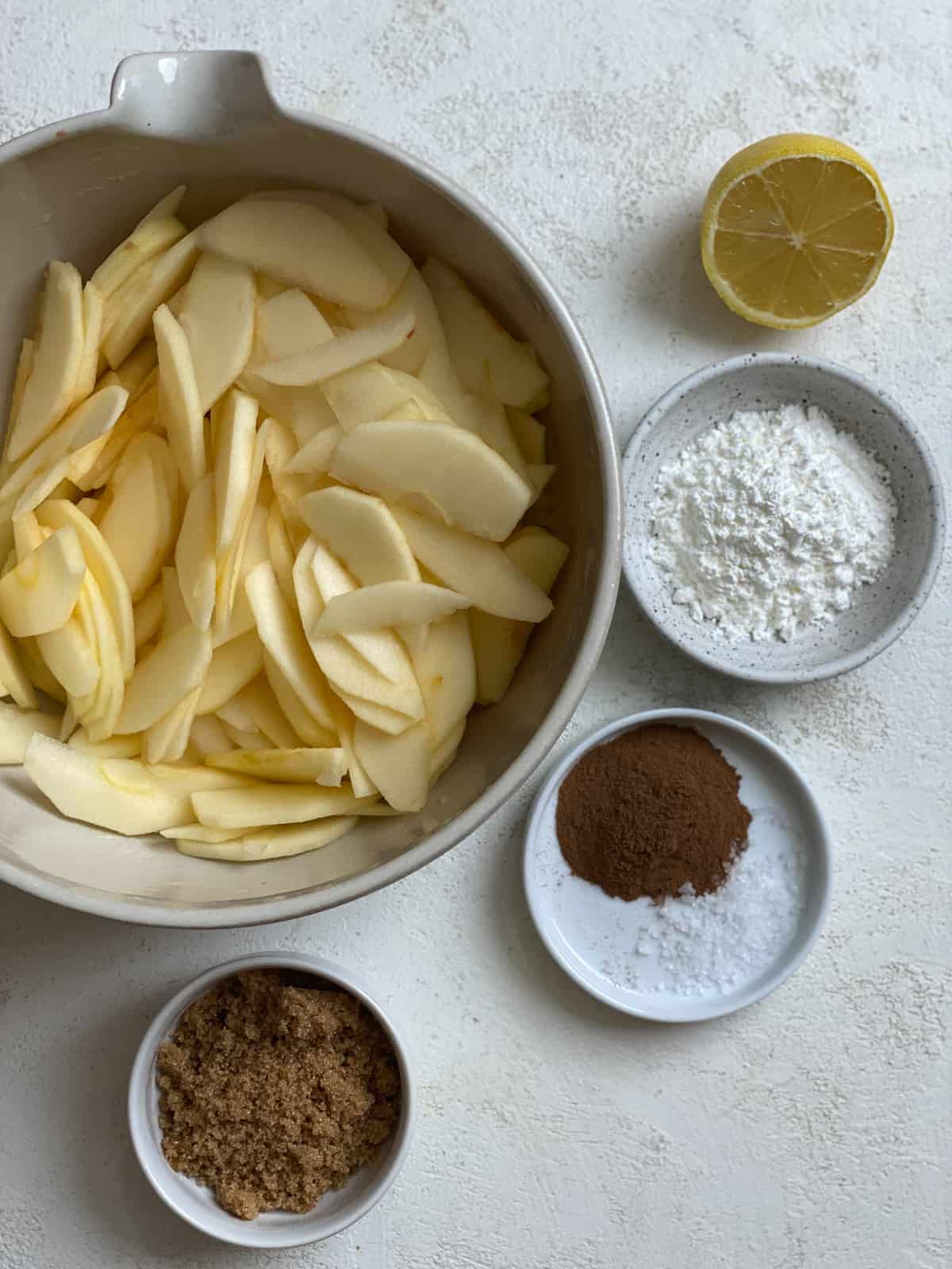 ingredients for Easy Apple Pear Pie measured out against a white surface