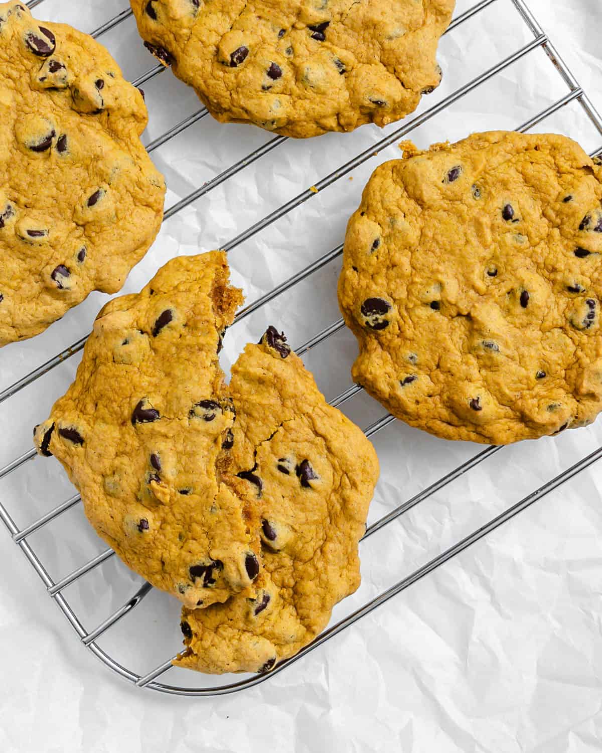 completed Vegan Pumpkin Chocolate Chip Cookies on a wire rack