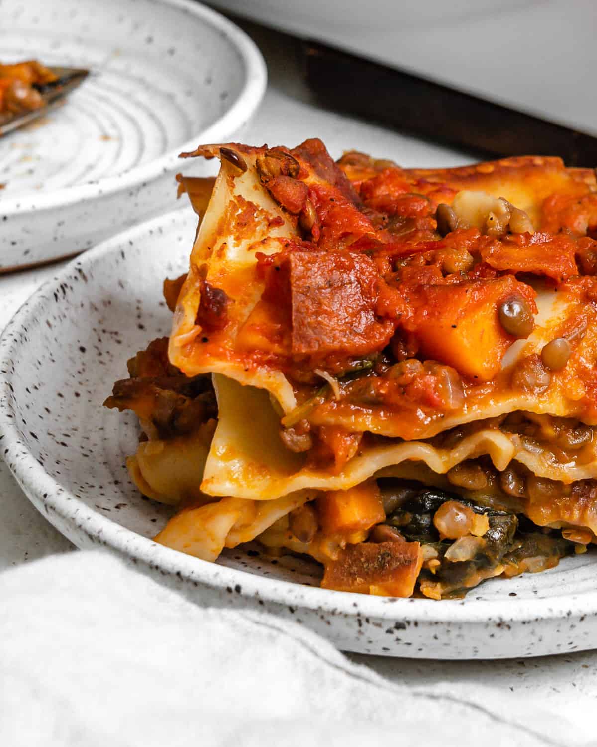 completed Easy Sweet Potato Lasagna plated on a white plate