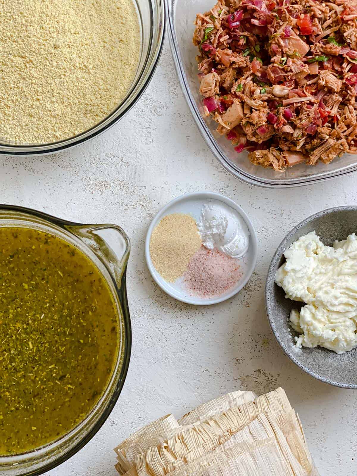 ingredients for Tamales measured out against a white surface