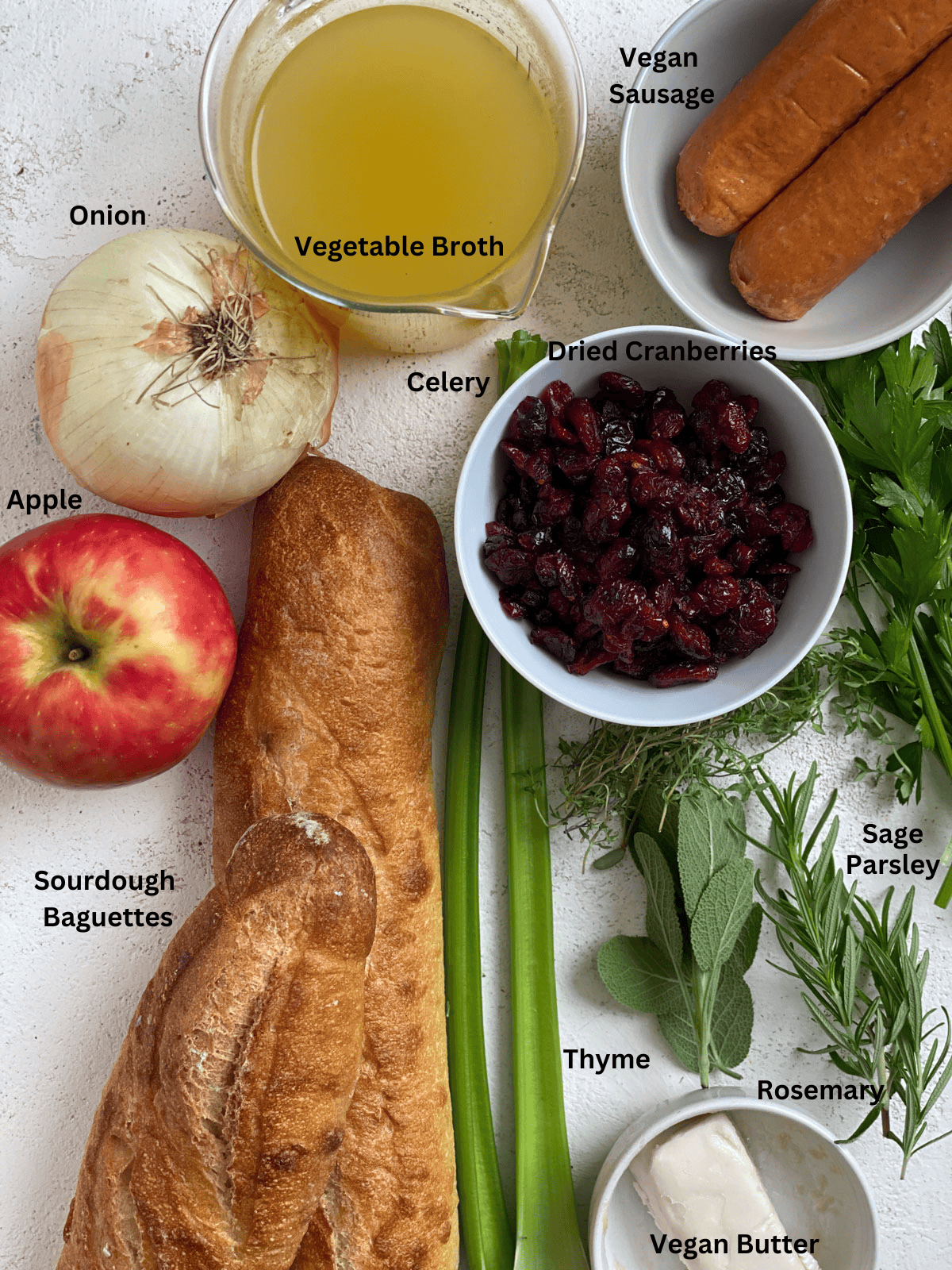 ingredients for The Best Vegan Stuffing measured out on a white surface