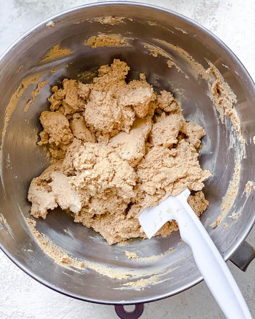 process shot of mixing ingredients together in bowl