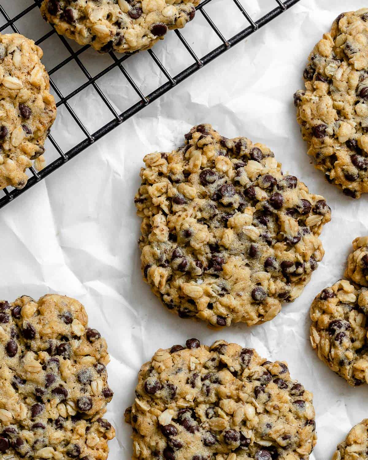 completed Vegan Oatmeal Chocolate Chip Cookies against a light surface