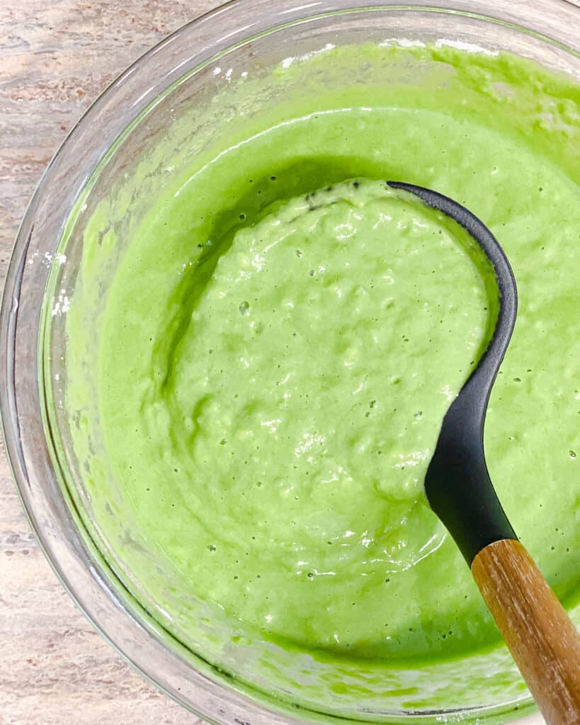 process shot of mixing ingredients together for Easy Banana Spinach Pancakes