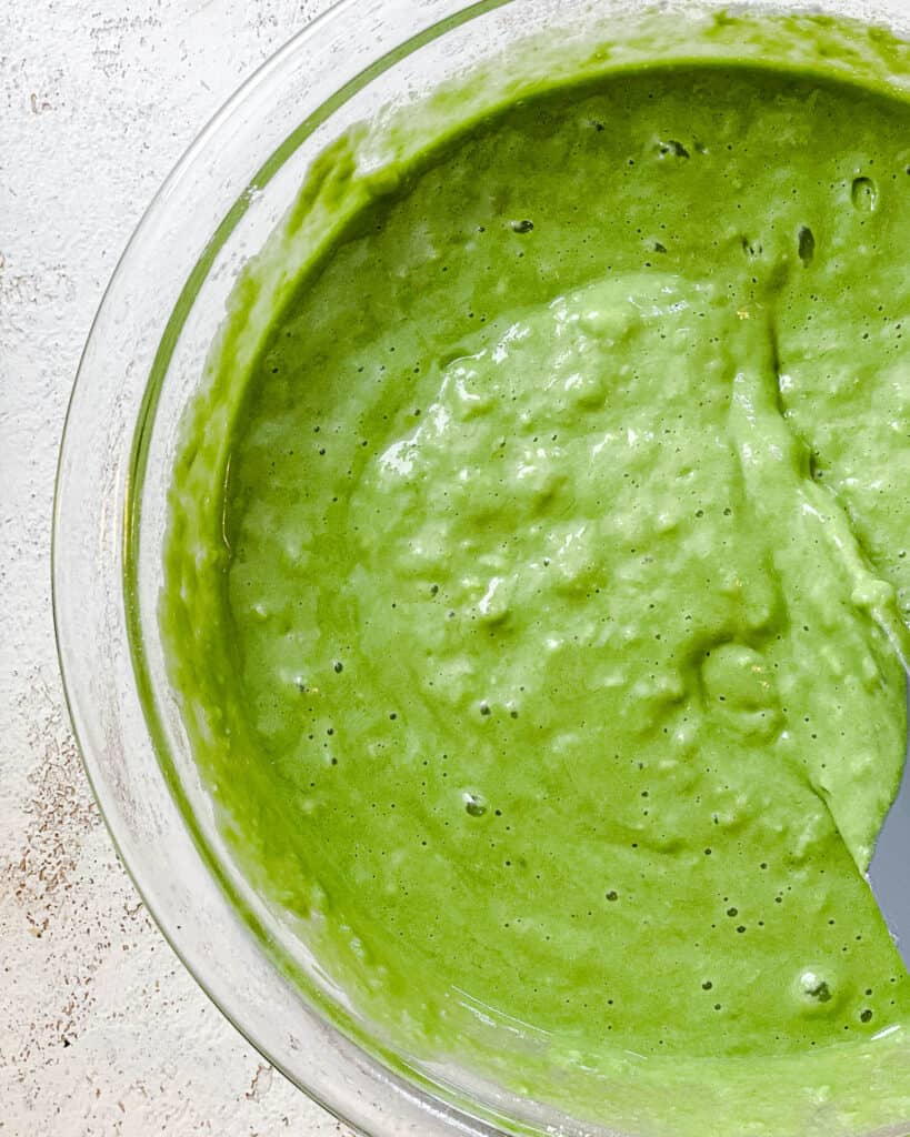 process shot of mixing ingredients together for Easy Banana Spinach Pancakes