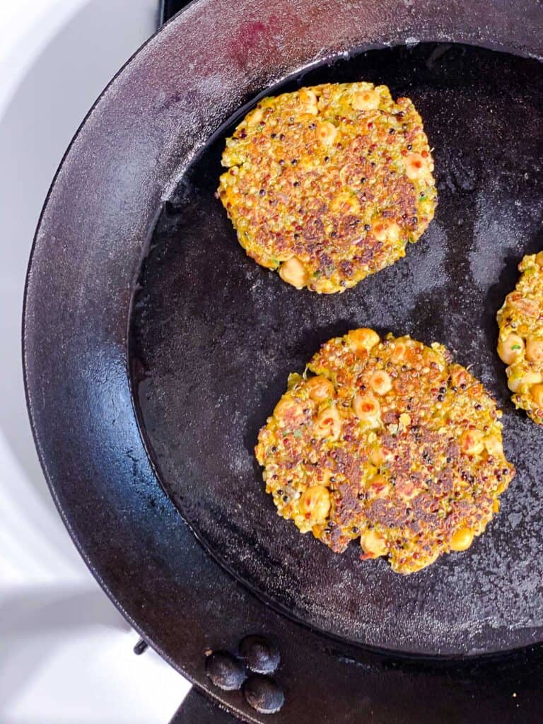 process shot of cooking patties on a skillet