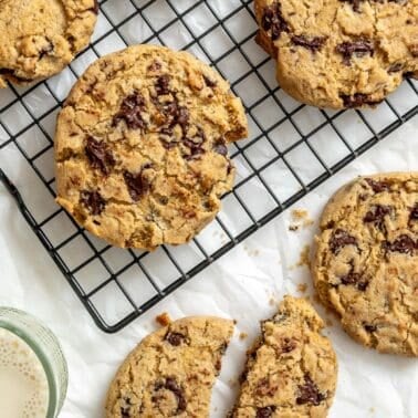 completed Dairy-free Chocolate Chip Cookies on wire rack and on white surface