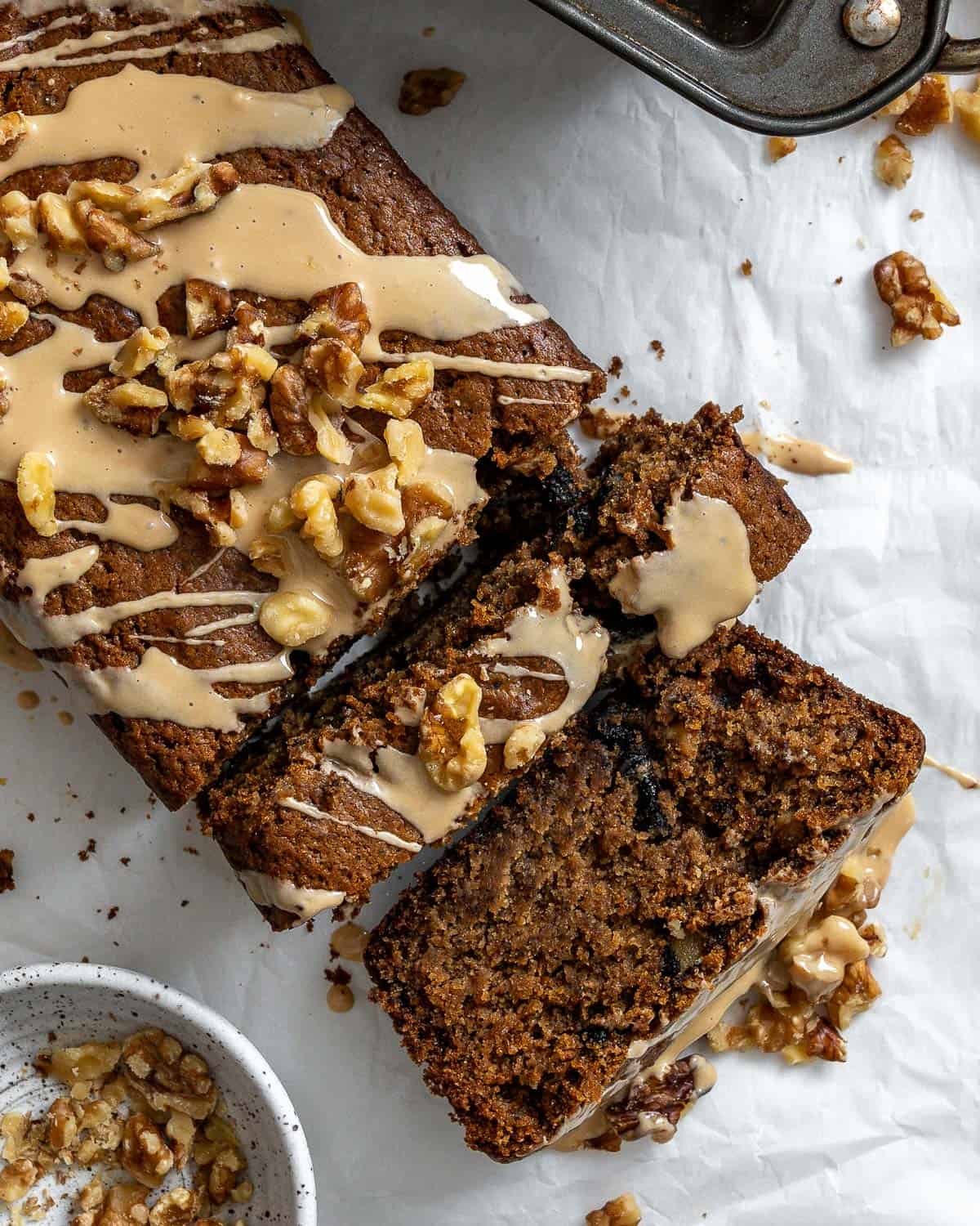 completed Coffee and Walnut Loaf Cake against a white surface