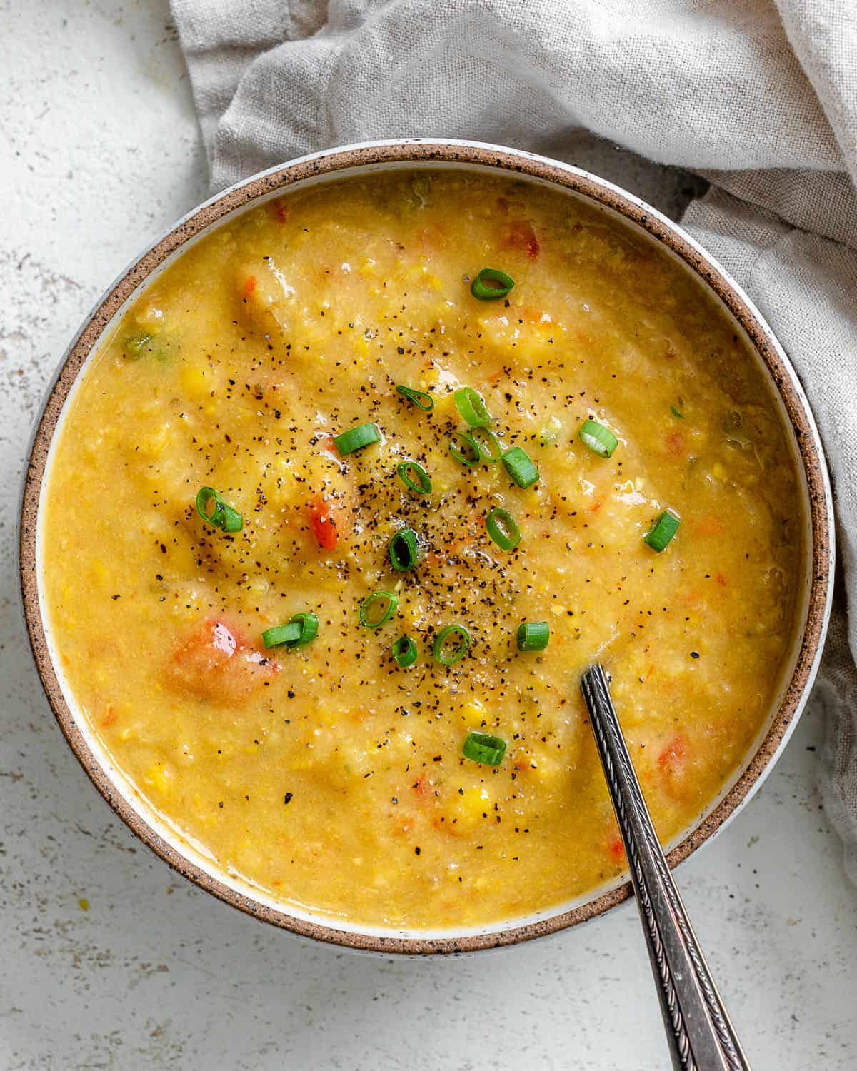 completed Corn Chowder in a bowl against a light surface