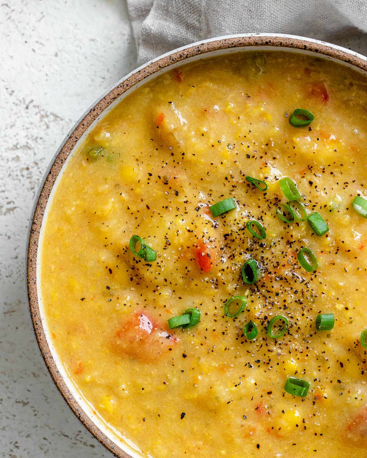 completed Corn Chowder in a bowl against a light surface