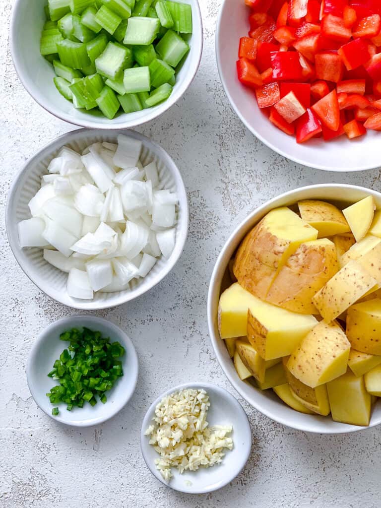 ingredients for Corn Chowder against a white surface