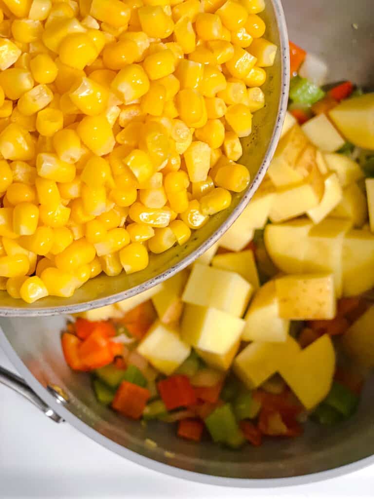 process shot of adding corn to pot