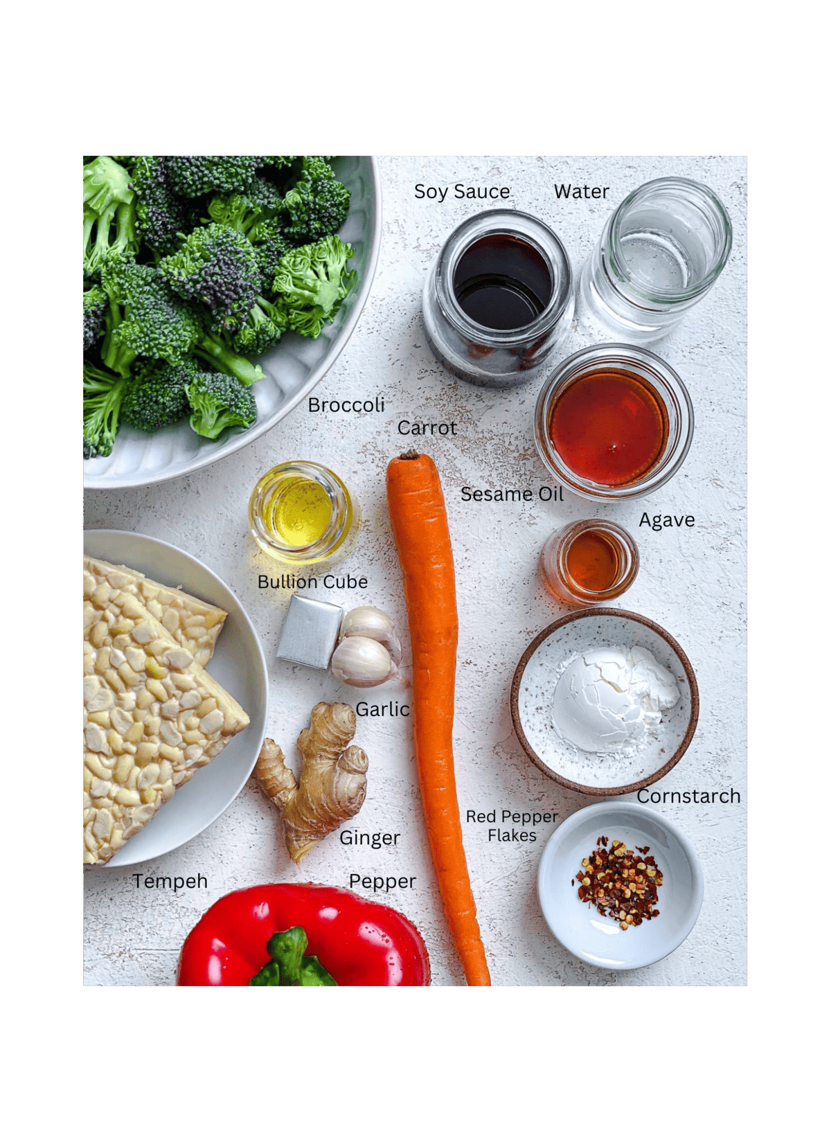 ingredients for Easy Tempeh Stir-Fry measured out against a white surface