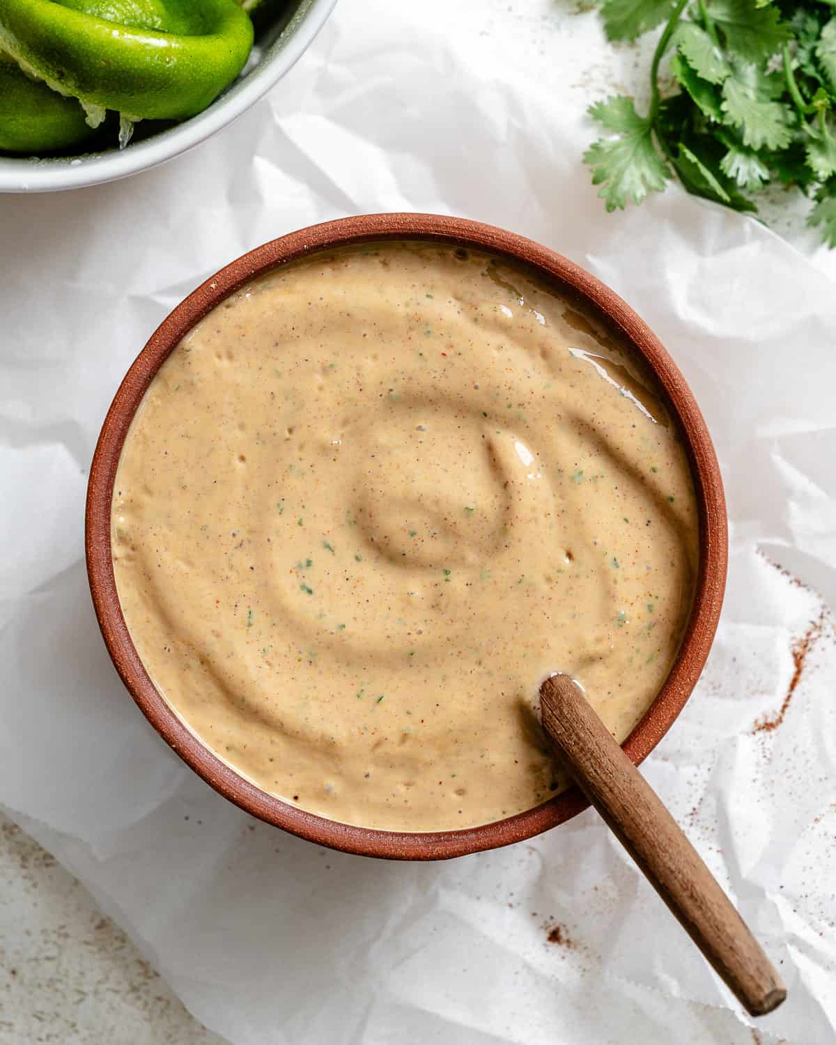 completed Vegan Chipotle Sauce [Taco Salad Dressing] against a white surface