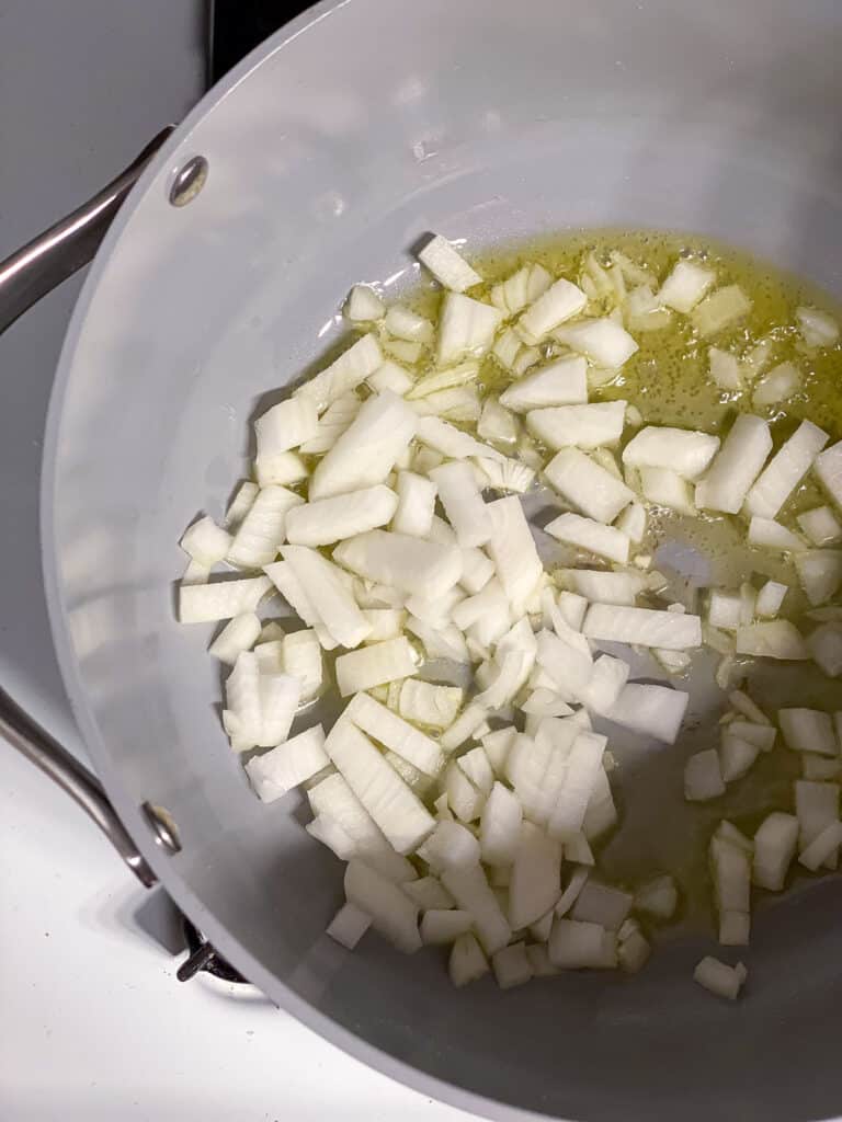 onions cooking in pan