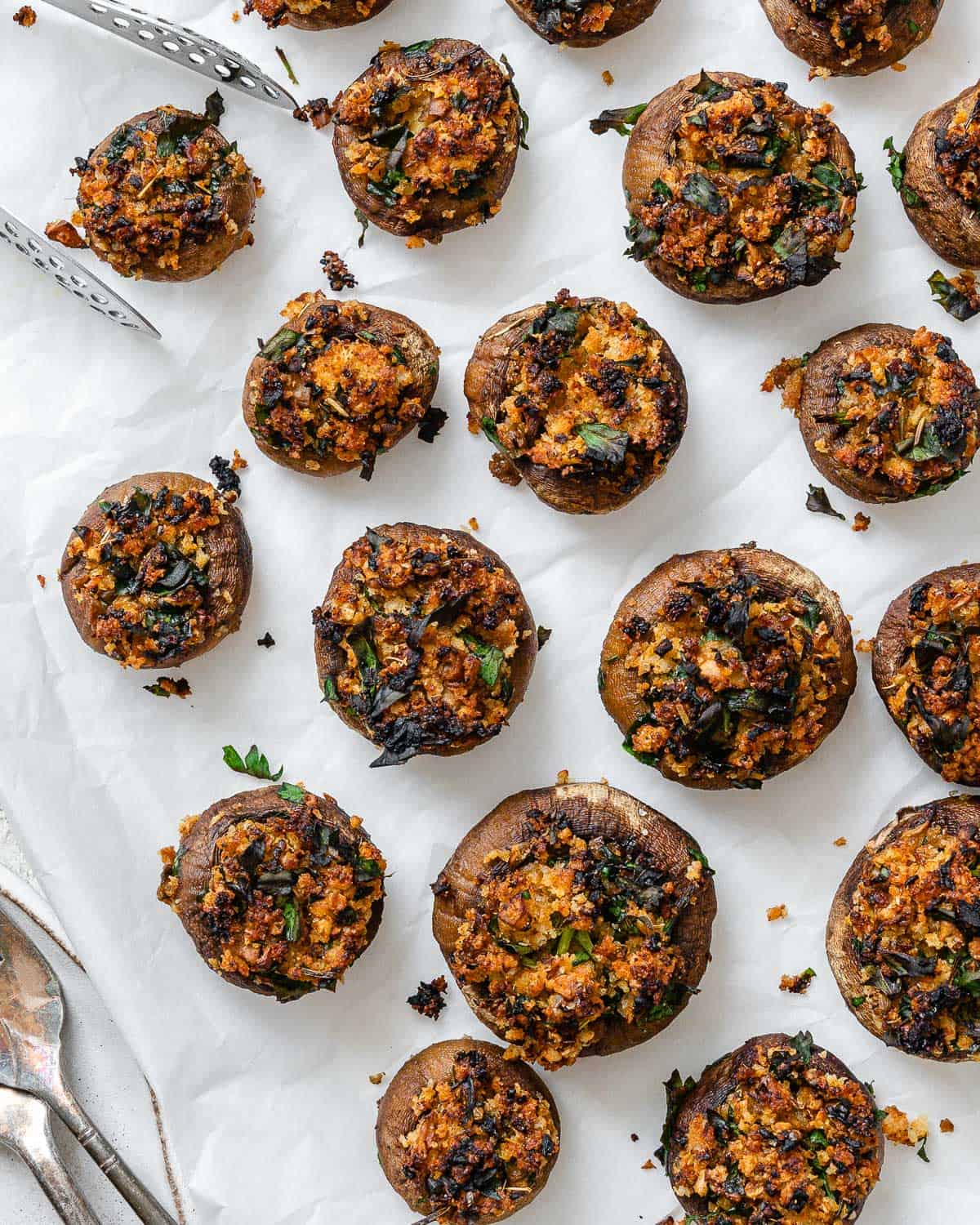 completed Easy Vegan Stuffed Mushrooms on a white surface