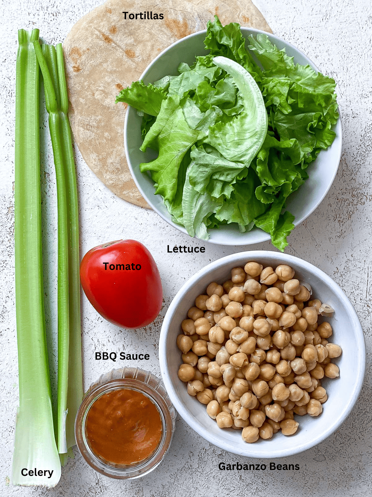 ingredients for BBQ Chickpea wraps measured on a white surface