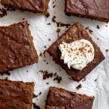 completed Vegan Gingerbread Cake slices on a white surface