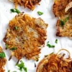 completed Vegan Potato Latkes on a white surface