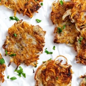 completed Vegan Potato Latkes on a white surface