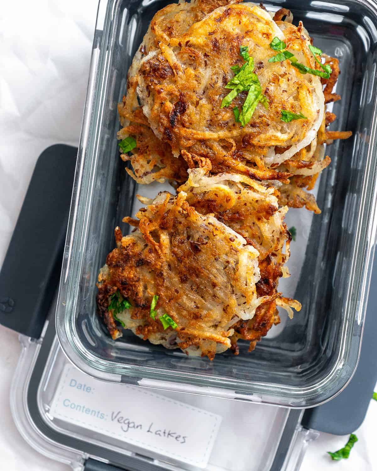 completed Vegan Potato Latkes in a container