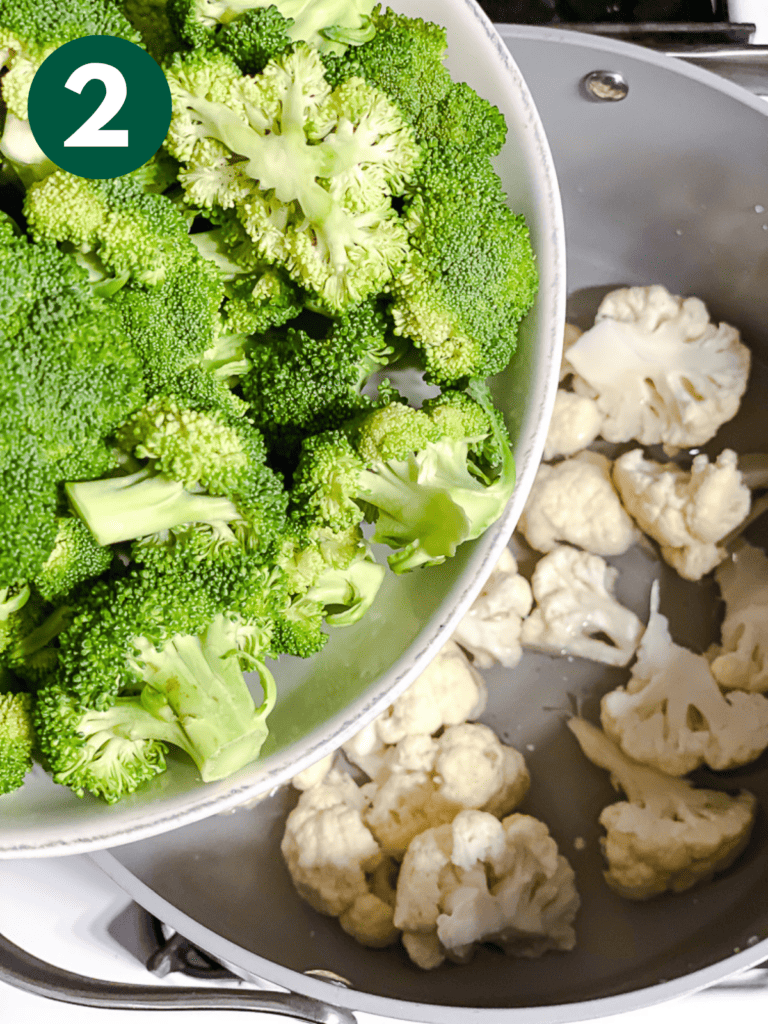 process shot of adding broccoli to pan