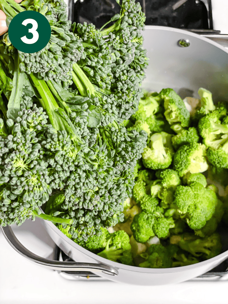 process shot of adding kale to pan