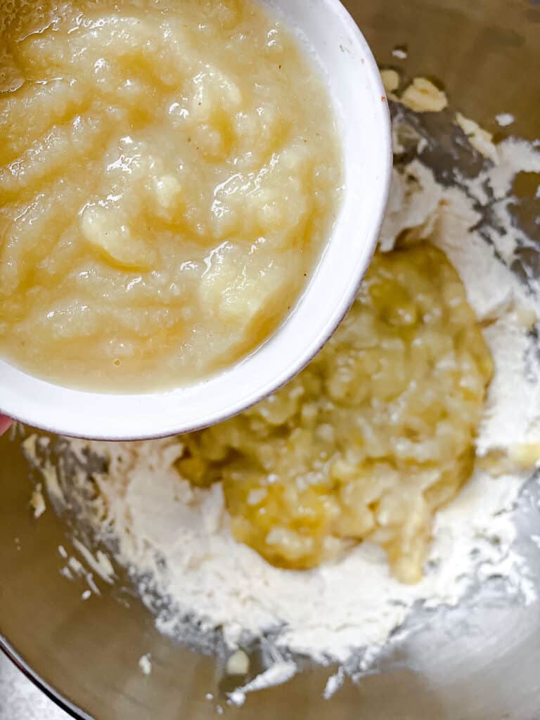 process shot showing adding apple sauce to bowl