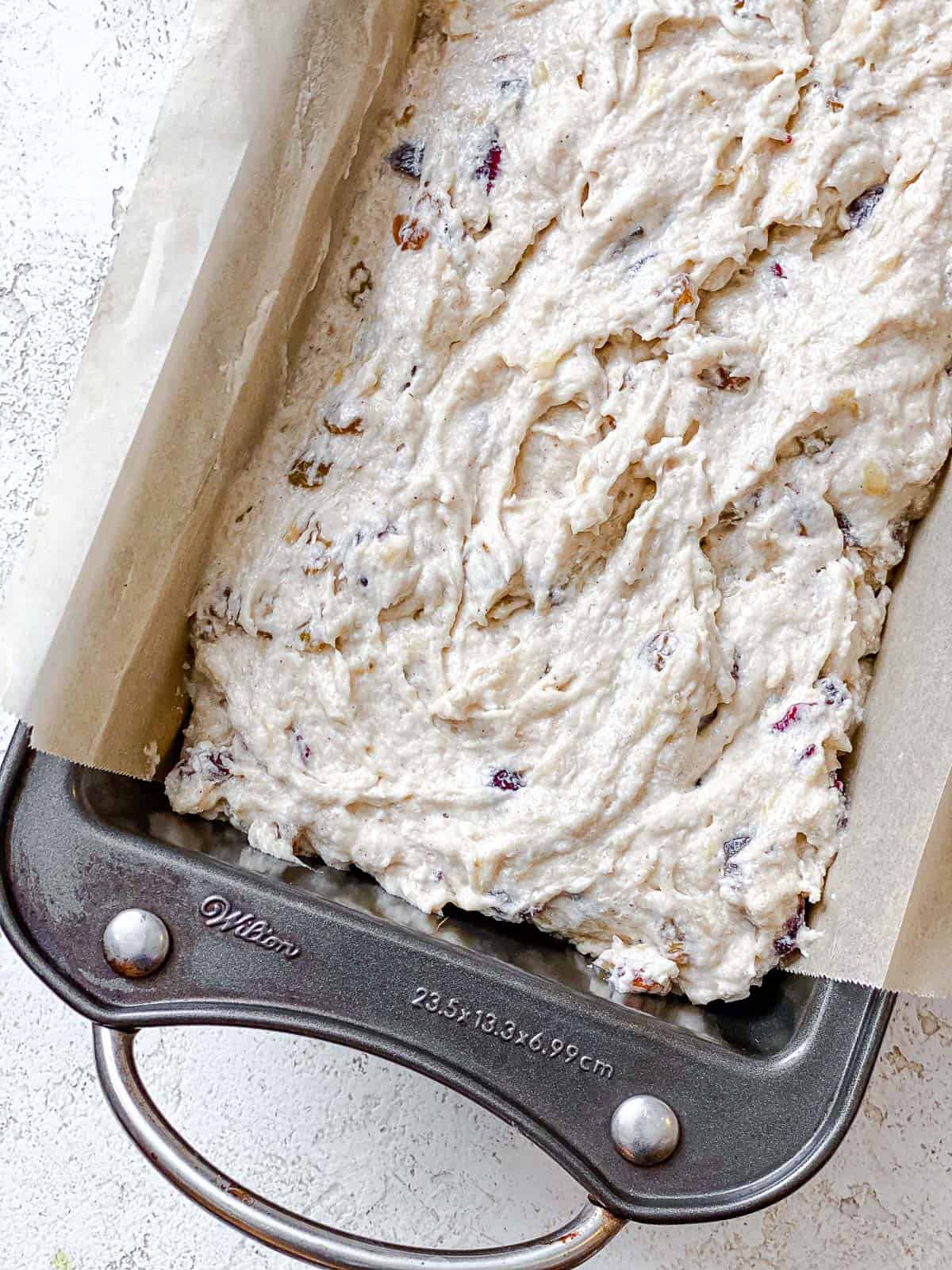 process shot showing batter in bread pan