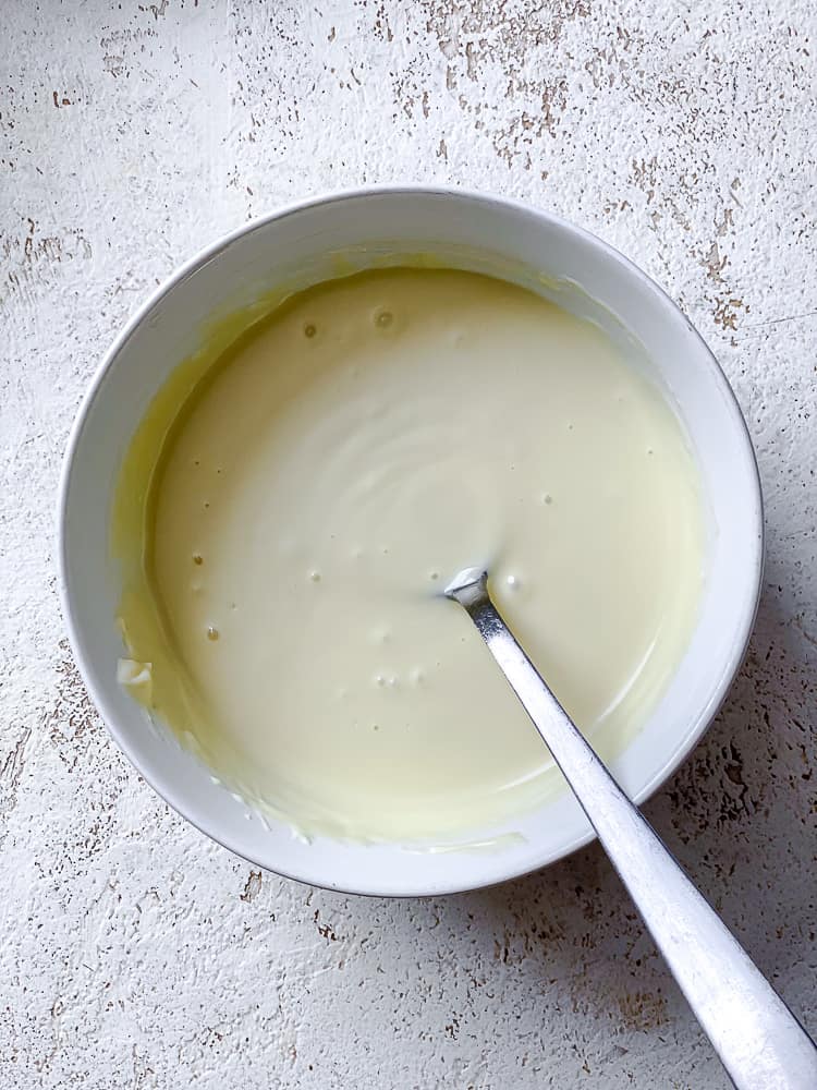 process shot showing vegan white chocolate in bowl