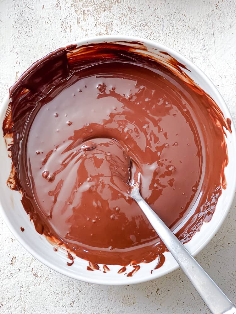 process shot showing vegan chocolate in bowl