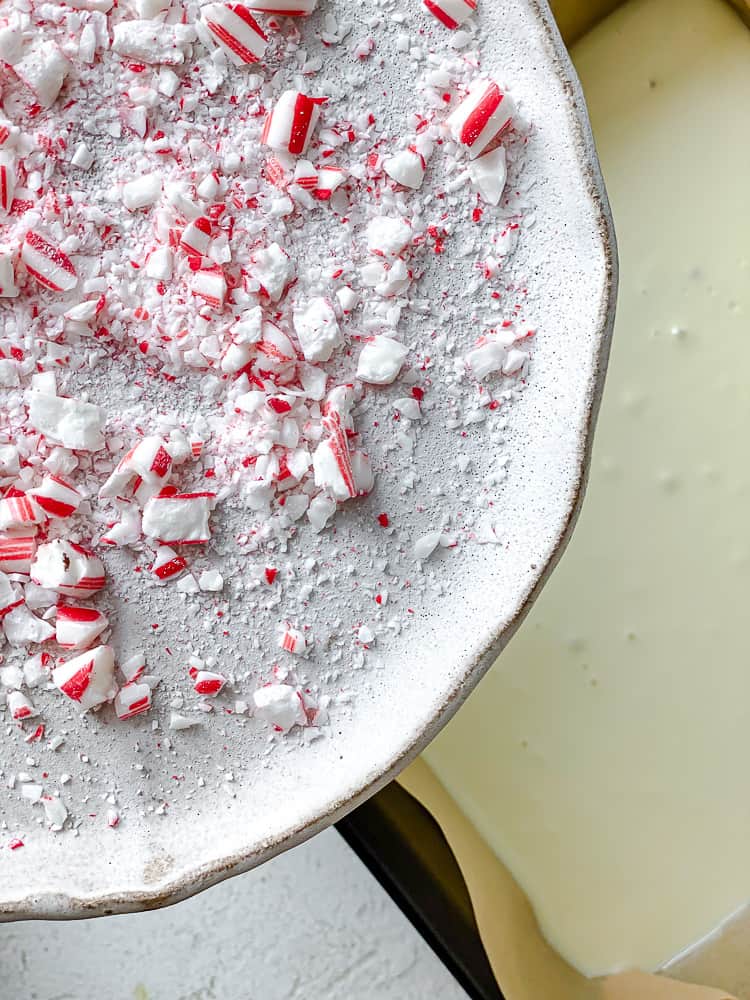 process shot showing adding peppermint to baking dish