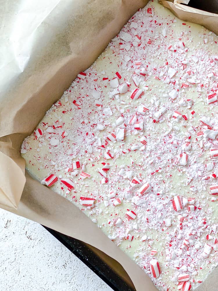 process shot showing peppermint bark in baking dish