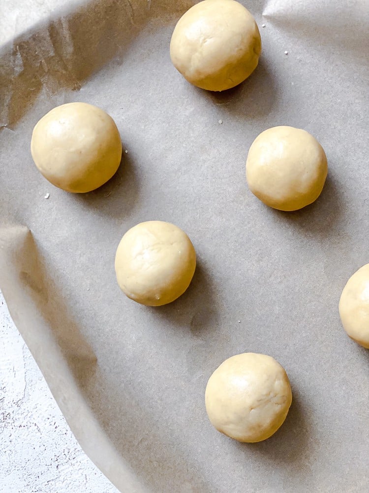 process shot of forming dough on baking sheet