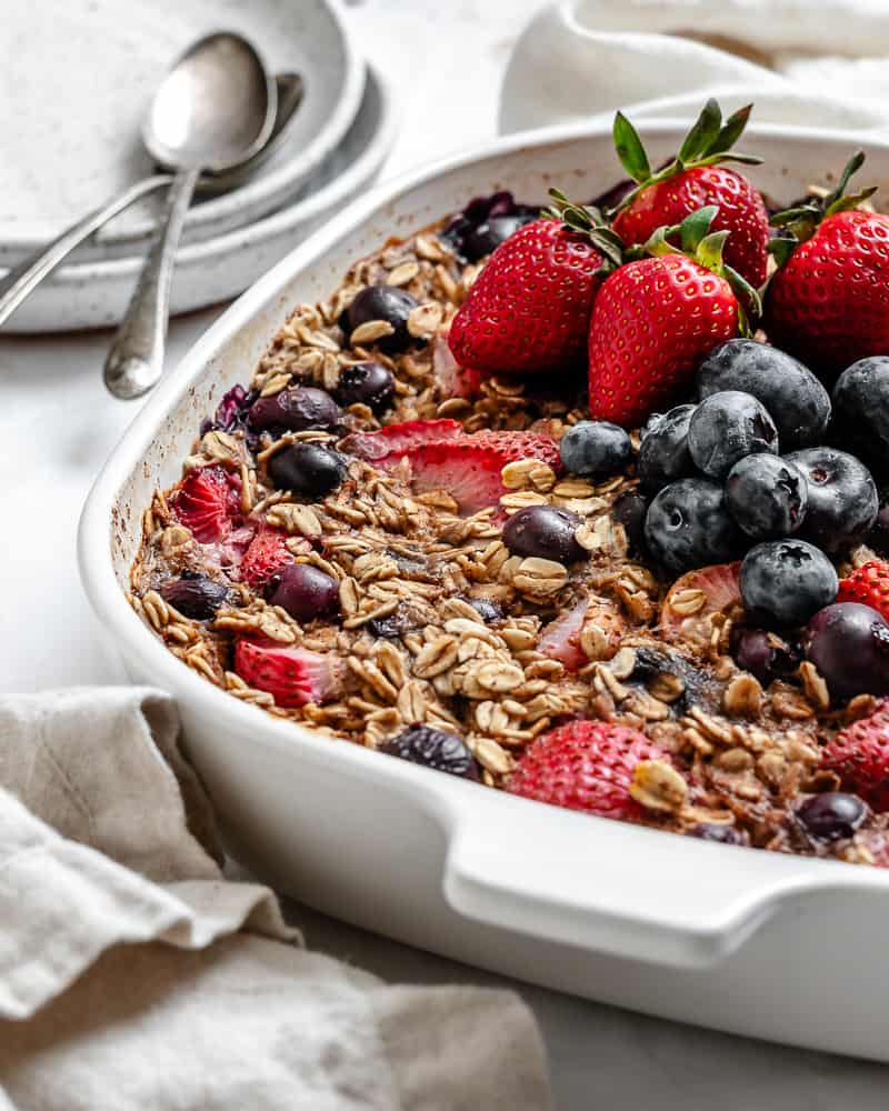 completed Vegan Baked Oatmeal [With Berries] in a baking dish